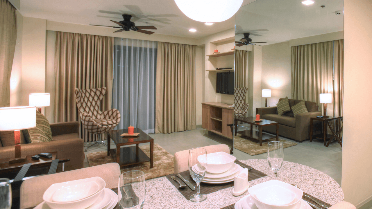 azalea hotels & residences baguio one-bedroom holiday apartment living and dining areas