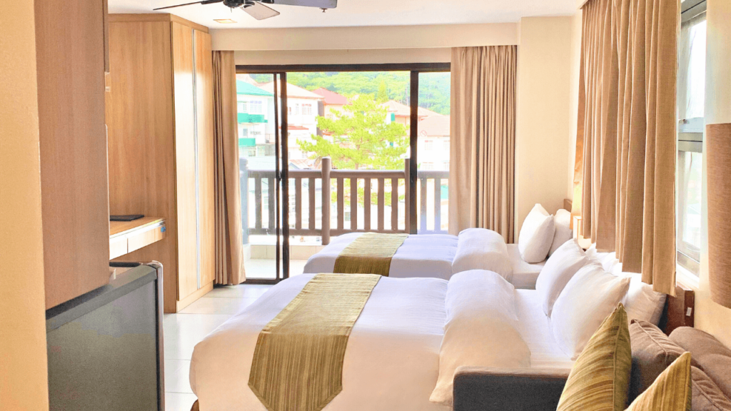 azalea hotels & residences baguio front balcony beds