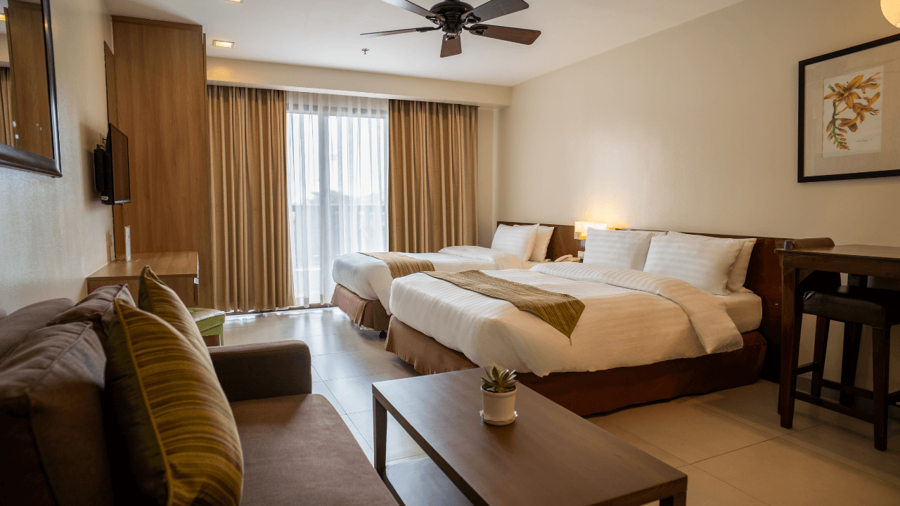 azalea hotels & residences baguio front balcony bed