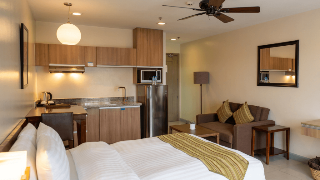 azalea hotels & residences baguio front balcony kitchenette and seating area