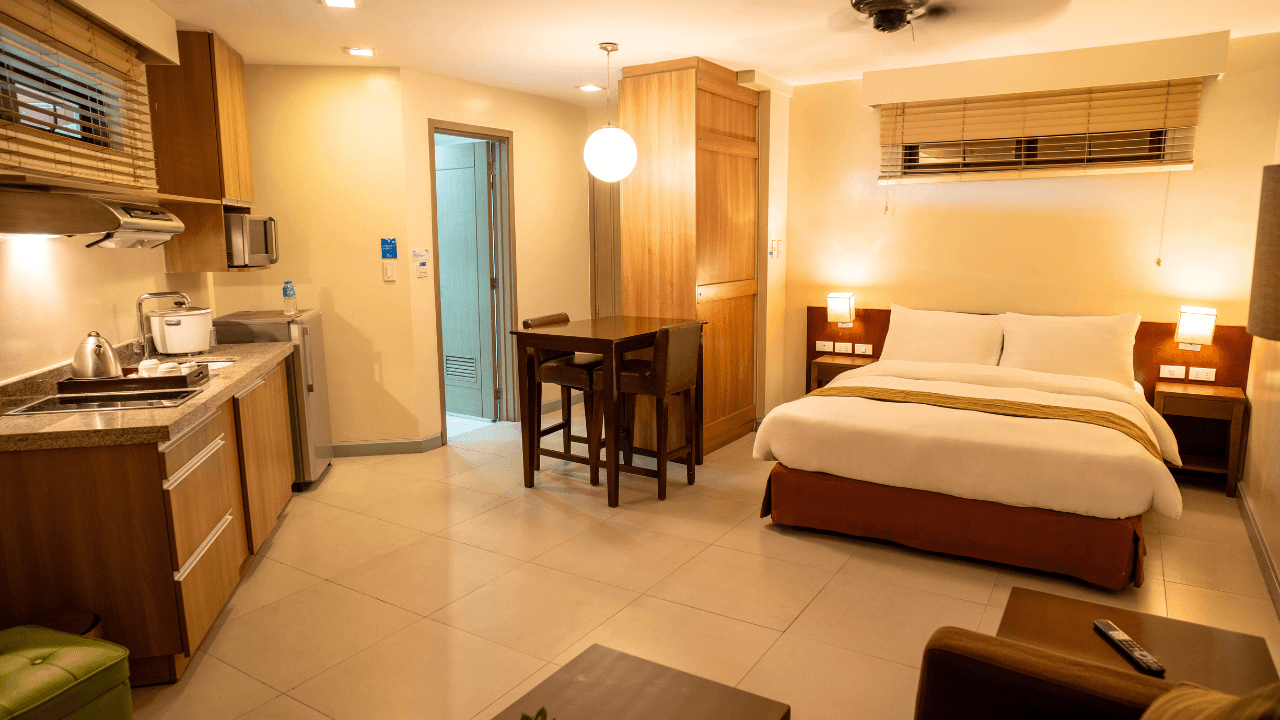azalea hotels & residences superior room bed